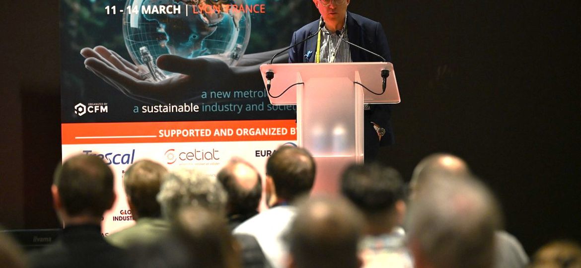 Cosimi Corleto acceptance speach in front of CIM2025 banner
