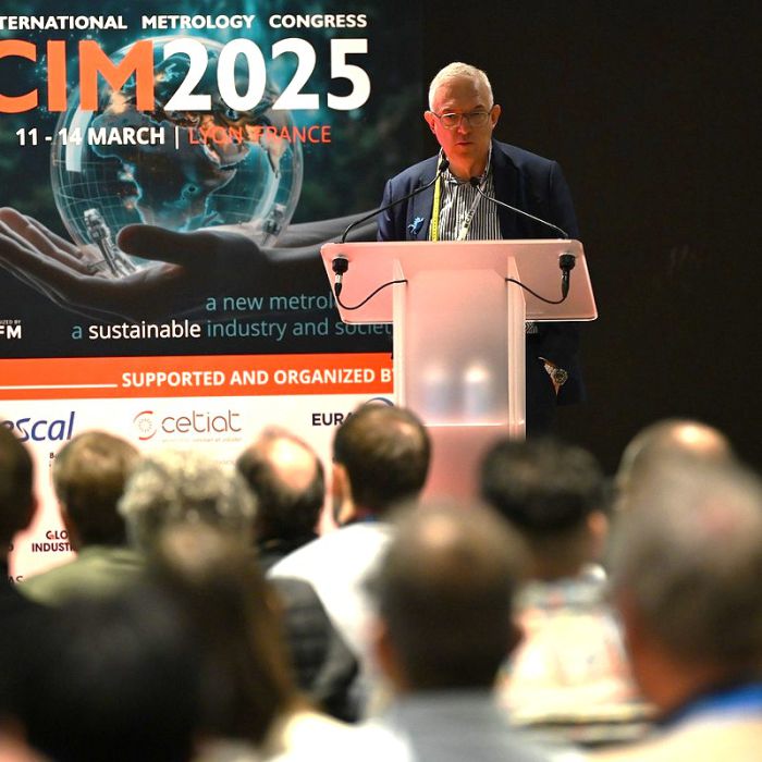 Cosimi Corleto acceptance speach in front of CIM2025 banner